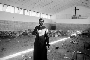 Father PJ Pearson in the church hall where the congregation were tear-gassed and attacked by police after the funerals of ANC members Robbie Waterwitch and Coline Williams