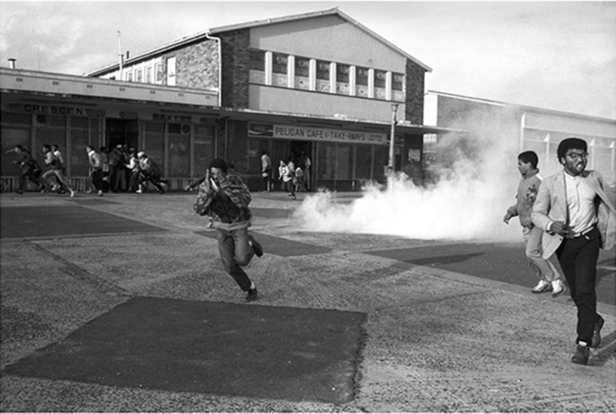 Police tear-gas Defiance Campaign meeting at the Bontehuewel Civic Centre in 1989