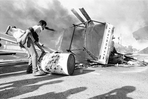 Youth protest, and barricades erected as a defence against police brutality, Belgravia Road, Athlone, Cape Town, 1985.