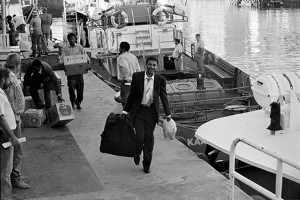 Ashley Forbes amongst freed political prisoners disembarking at Cape Town harbour on their release from Robben Island prison. 1991.